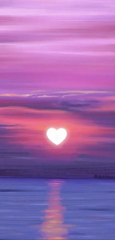 Heart-shaped sunset over a calm ocean with purple skies.