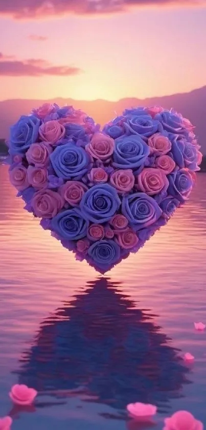 Heart-shaped bouquet of roses at sunset over water.