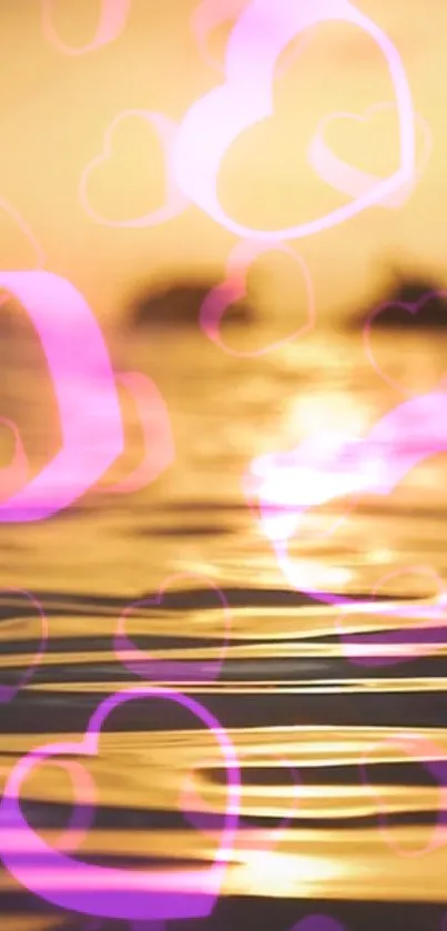 Romantic sunset wallpaper with pink hearts over serene water.