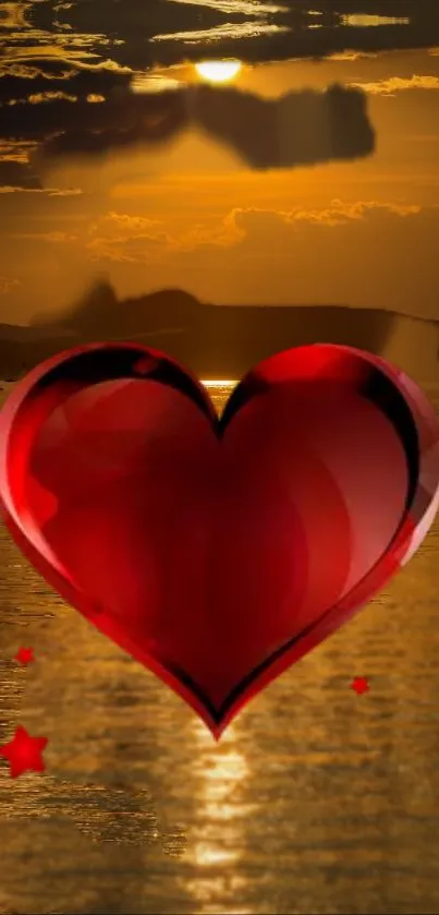Red heart against a golden sunset over water, creating a romantic ambiance.