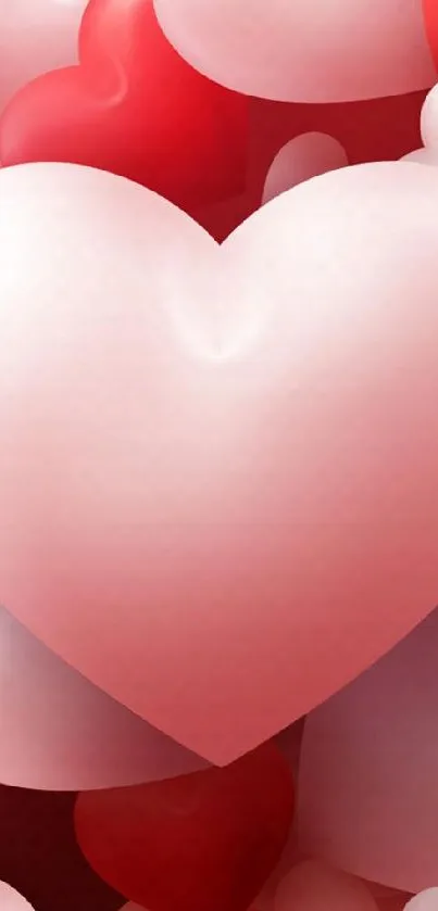 Mobile wallpaper with red and pink hearts.