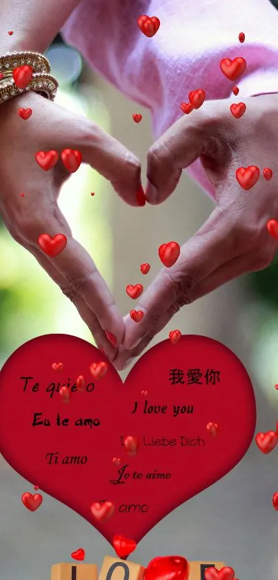 Hands forming a heart with love words in multiple languages.