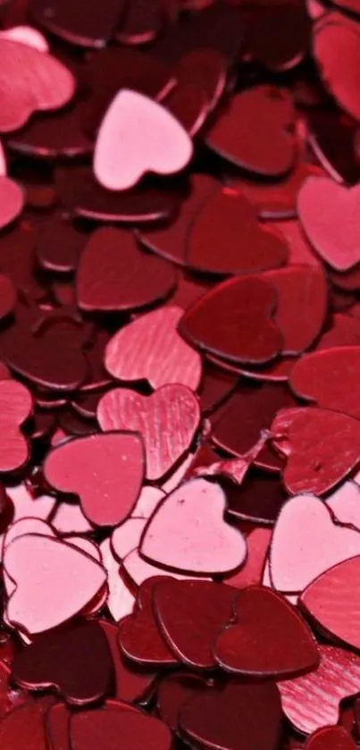 Red and pink heart confetti design wallpaper.