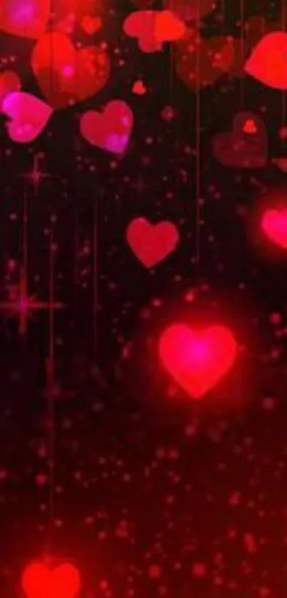 Romantic red hearts glowing on dark background.