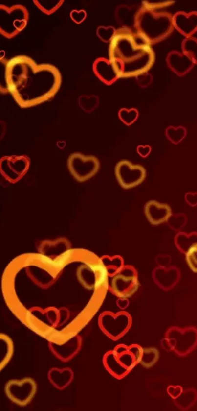 Romantic heart wallpaper with glowing red and orange hearts.