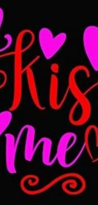 Romantic 'Kiss Me' wallpaper with red and pink hearts.