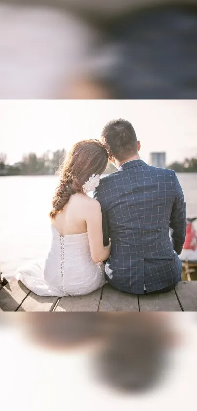 Romantic couple sitting by the lake, enjoying a serene, picturesque view.