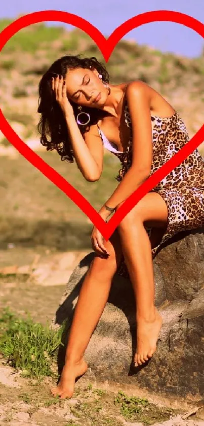 Woman by lake with red heart frame, adding a romantic touch.