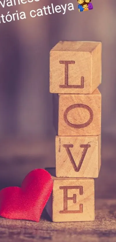 Wooden blocks spelling LOVE with red heart.