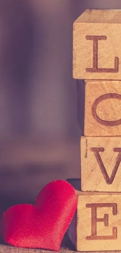 Wooden blocks spelling 'LOVE' with a red heart.