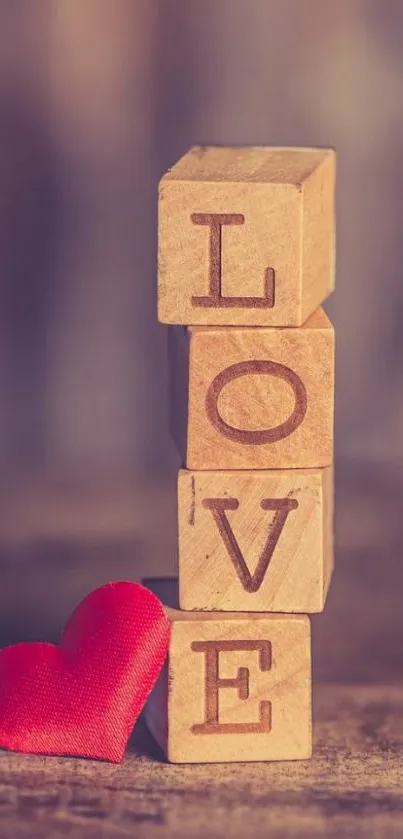 Romantic mobile wallpaper with 'LOVE' blocks and red heart.