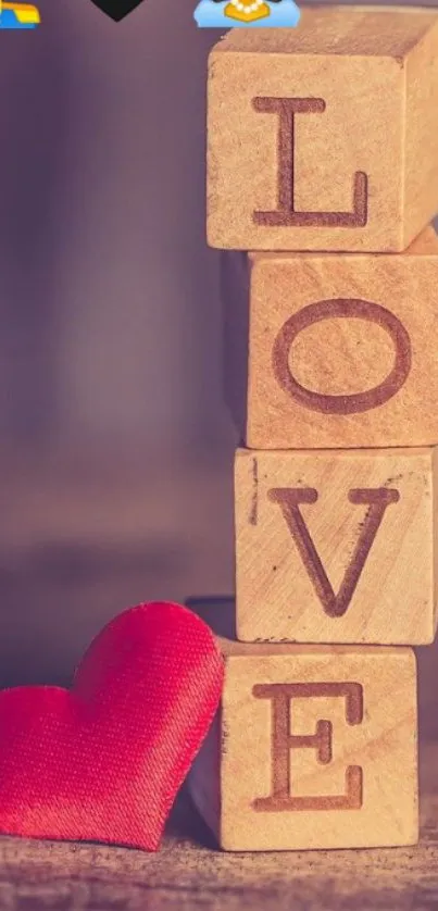 Wooden blocks spelling LOVE with heart.