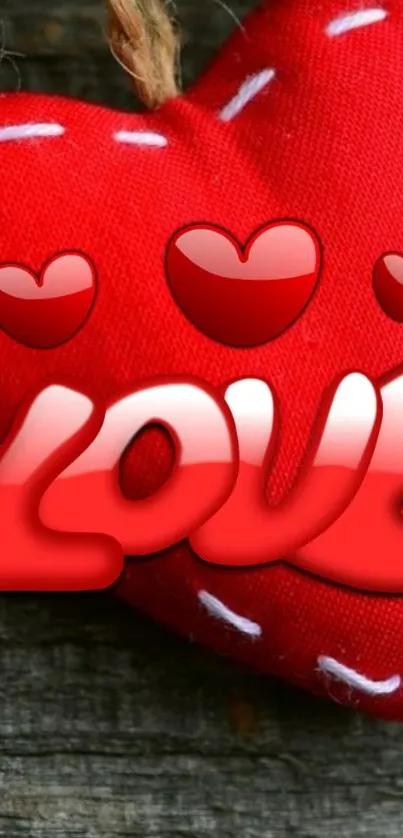 Red heart with 'Love' text on grey background.