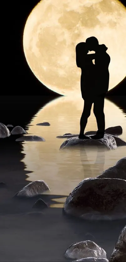 Silhouette of a couple kissing under a large full moon reflecting on water.