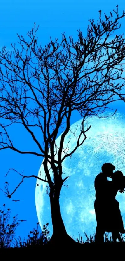 Silhouette of a couple kissing under a tree with a large moon in the background.