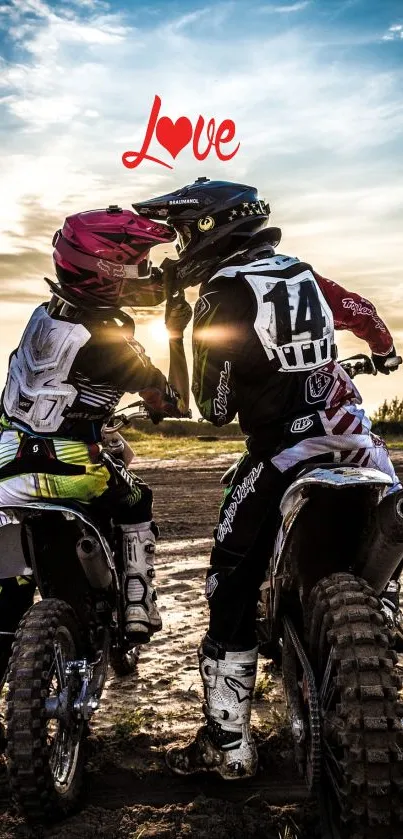 Motocross couple at sunset sharing romantic moment