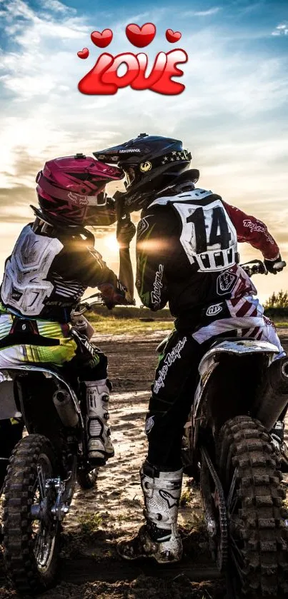 Motocross couple sharing a sunset moment.