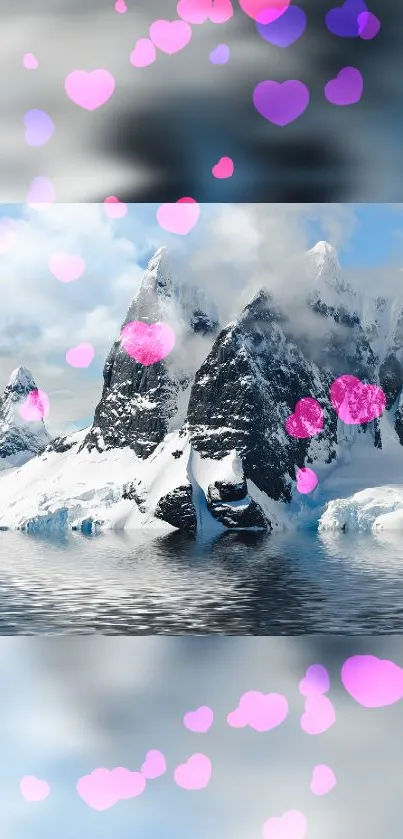 Snow-covered mountains with floating pink hearts on a serene, reflective surface.