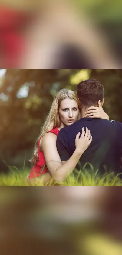 Couple embracing in a lush green outdoor setting with natural lighting.