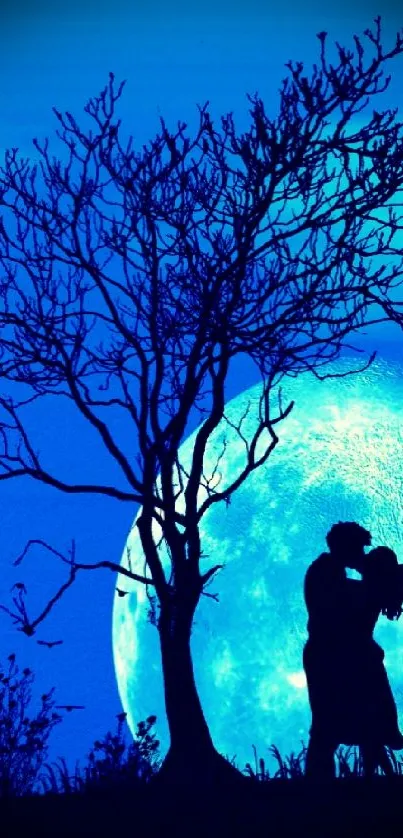 Silhouette of couple kissing under glowing turquoise moon.