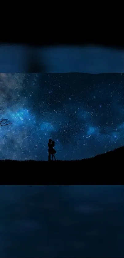 Silhouette couple under a starry night sky with deep blue hues.