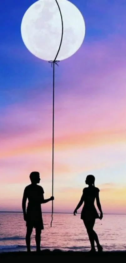 Couple holding a moon balloon over a serene ocean sunset.