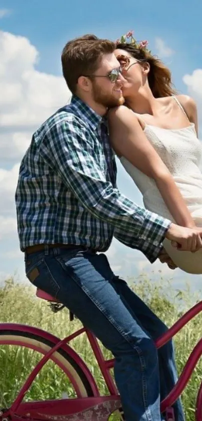 Couple enjoying a romantic bicycle ride under a clear blue sky.