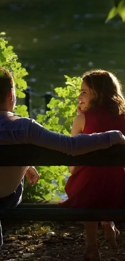 Romantic couple sitting on park bench by lake.