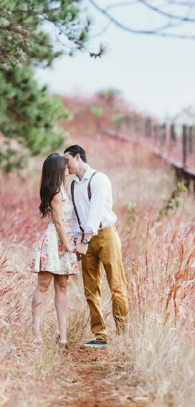 Romantic couple walking in grassy forest path.