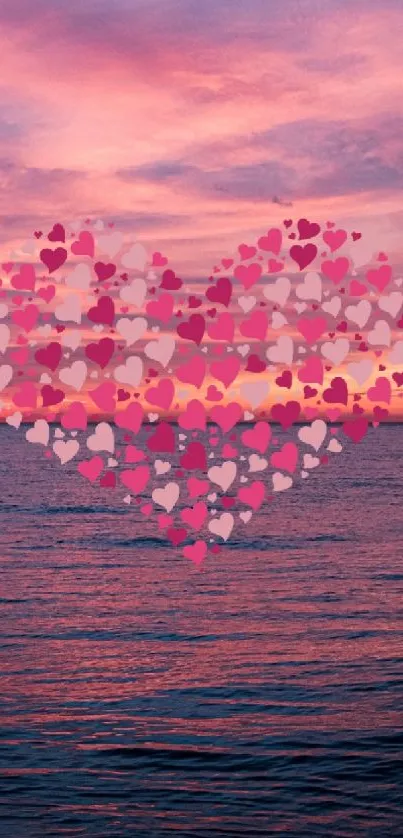 Romantic pink heart on ocean sunset background wallpaper.