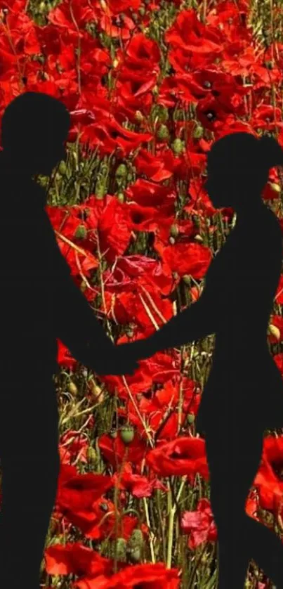 Silhouette of a couple in a vibrant poppy field.