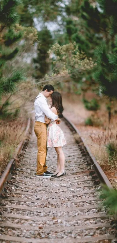 Romantic couple on railway track in nature scene.