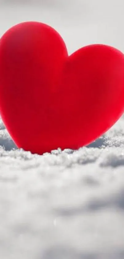 Red heart on snowy white background mobile wallpaper.