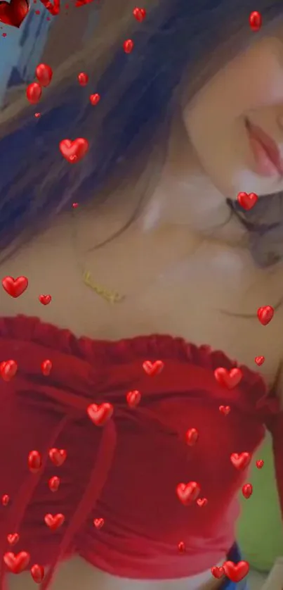 Woman in red top with floating heart icons on mobile wallpaper.