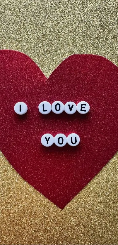 Red heart on gold glitter background with 'I Love You' message.