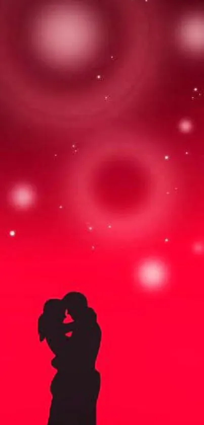 Romantic red wallpaper with silhouette couple embracing under stars.