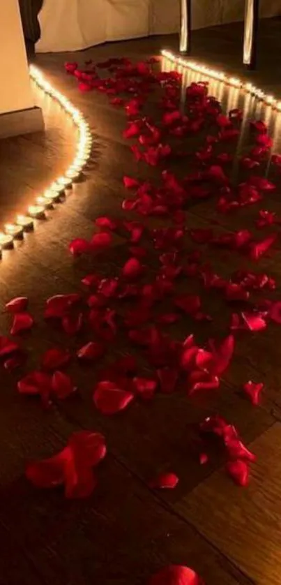 Dimly lit pathway with red rose petals and candles creating a romantic atmosphere.