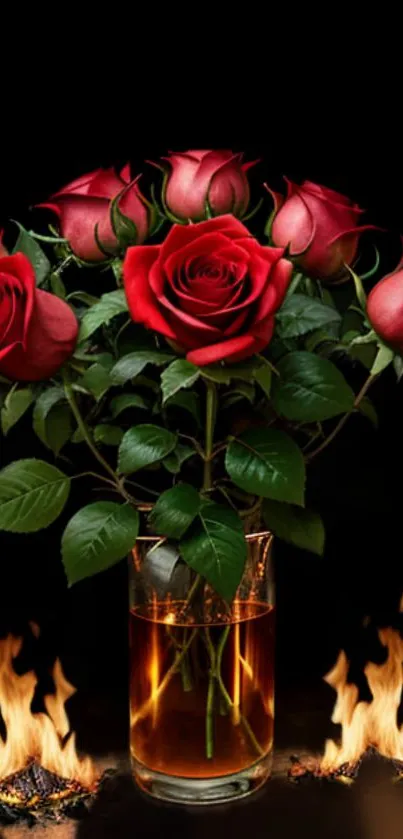 Bouquet of red roses with flames in a glass vase against a dark background.