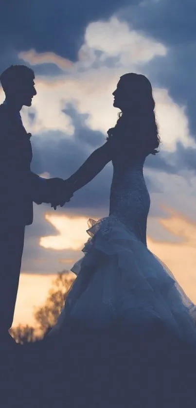 Romantic silhouette of a couple at sunset.