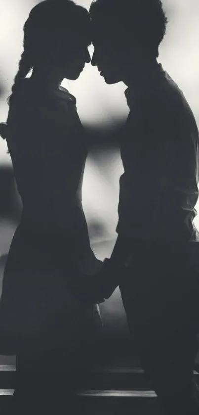 Silhouette of a couple in love, close together.