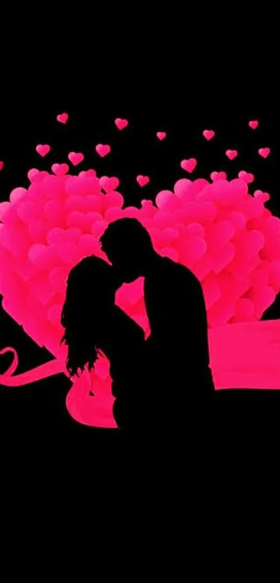 Silhouette couple in front of a pink heart.