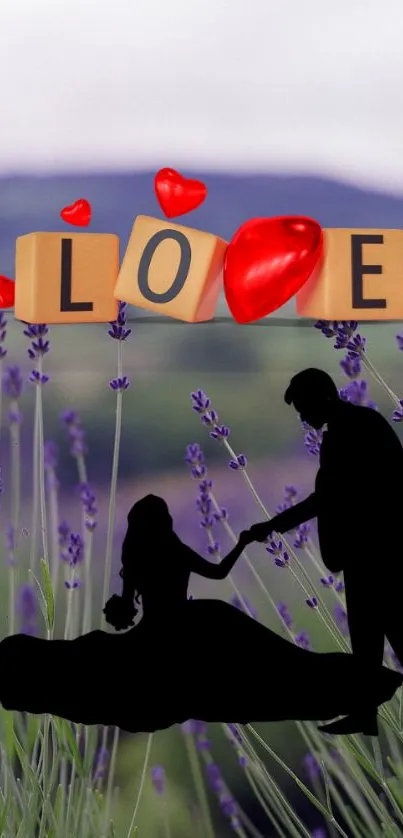 Silhouette couple with love blocks in lavender field.