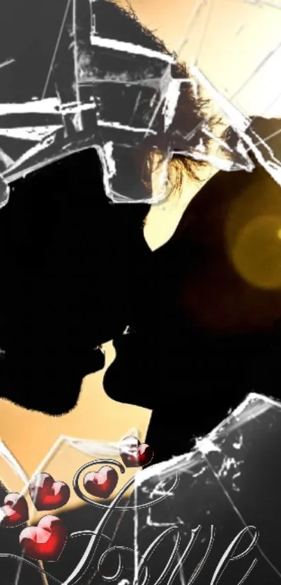 Silhouette of a couple kissing through broken glass with a love theme.