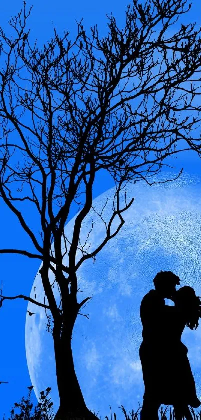 Silhouette of a couple kissing under a tree with a blue moon background.