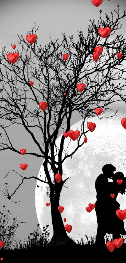 Silhouetted couple kissing beneath a full moon with blue sky backdrop.