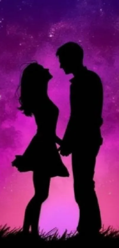 Silhouette of couple against a purple starry night sky wallpaper.