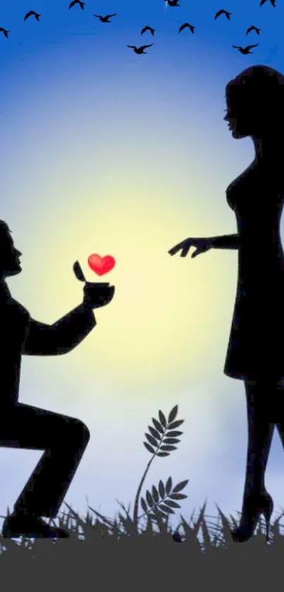 Silhouette of a man proposing with a heart at sunset.