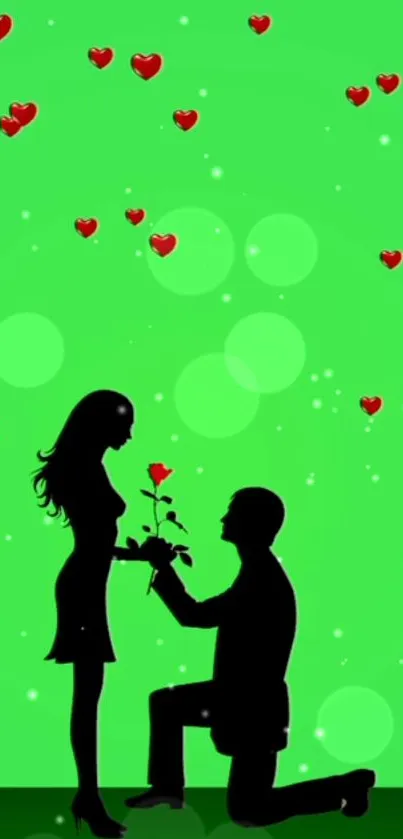 Silhouette of a couple proposing with red hearts on a green background.