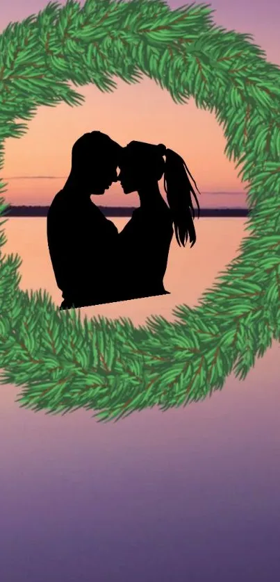 Romantic couple silhouette with sunset background and green wreath.