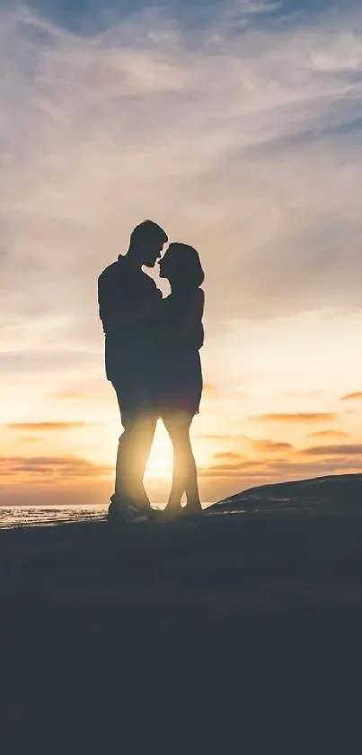 Romantic couple silhouette at sunset with scenic view.